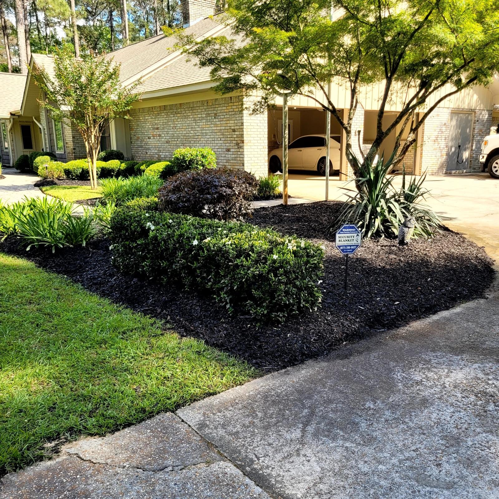 Mulch and decorative gravel installed around landscaping